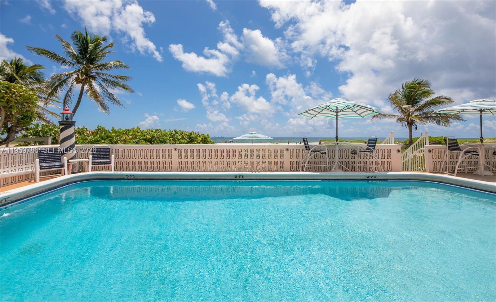 3401 Northeast 10th Street, Unit 5 Pompano Beach, FL 33062 - Photo 3 of 4 a view of backyard with swimming pool and patio