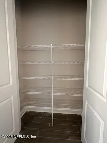 a empty closet with white paint