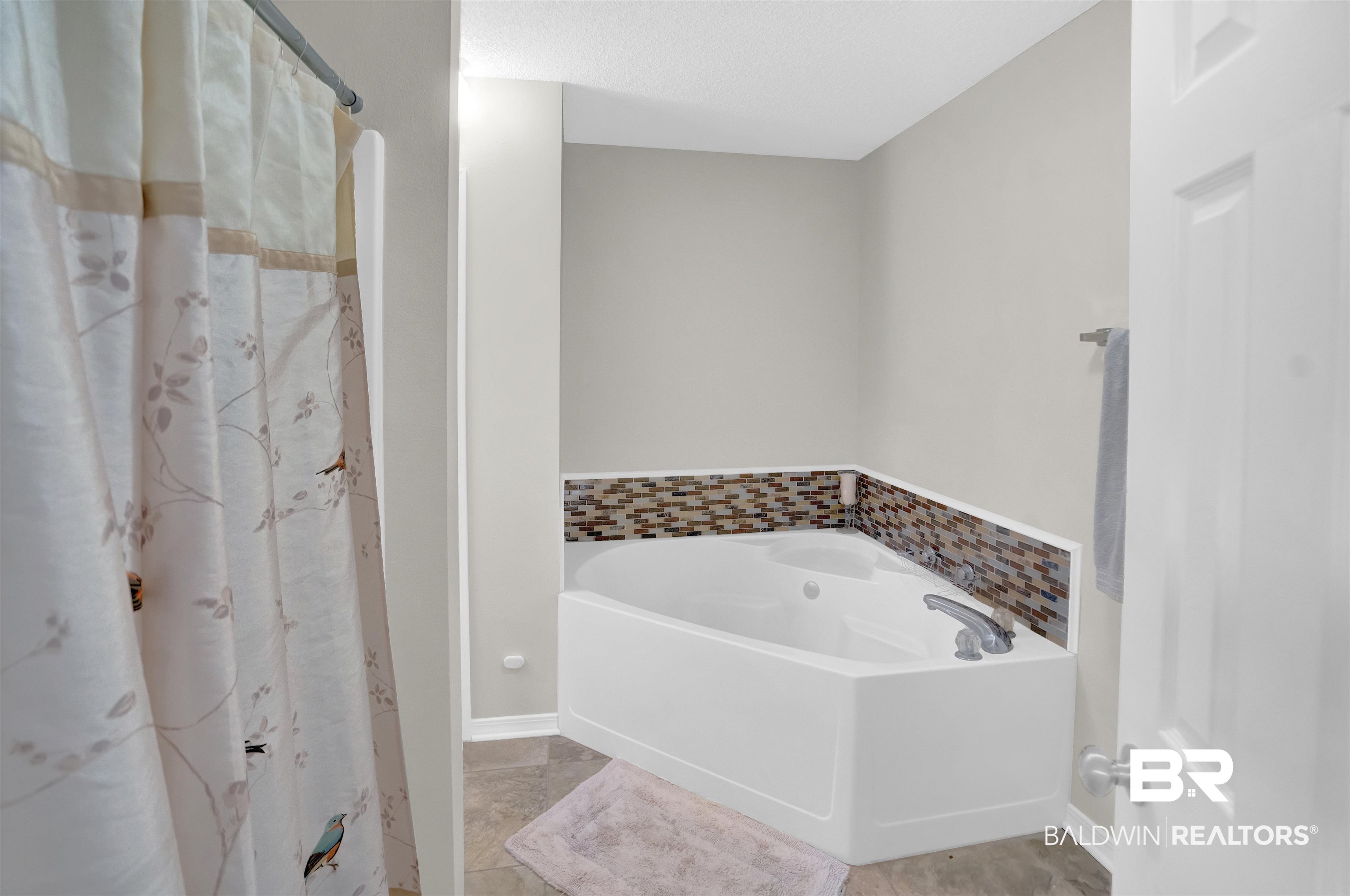 30871 Stanton Road Spanish Fort, AL 36527 - Photo 29 of 35 Bathroom with independent shower and bath