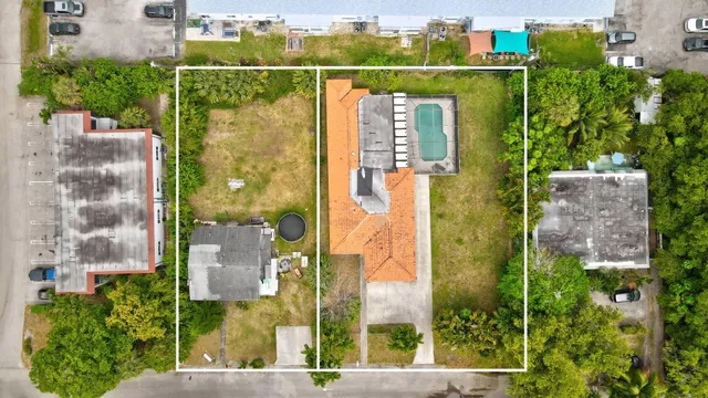 aerial view of a house with a garden