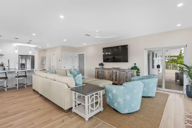 a view of swimming pool with outdoor seating