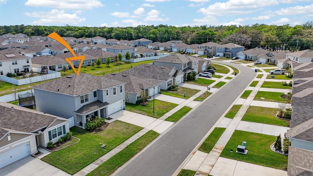 1809 Myrtlebrooke Drive Edgewater, FL 32141 - Photo 50 of 58 a view of a city with lawn chairs