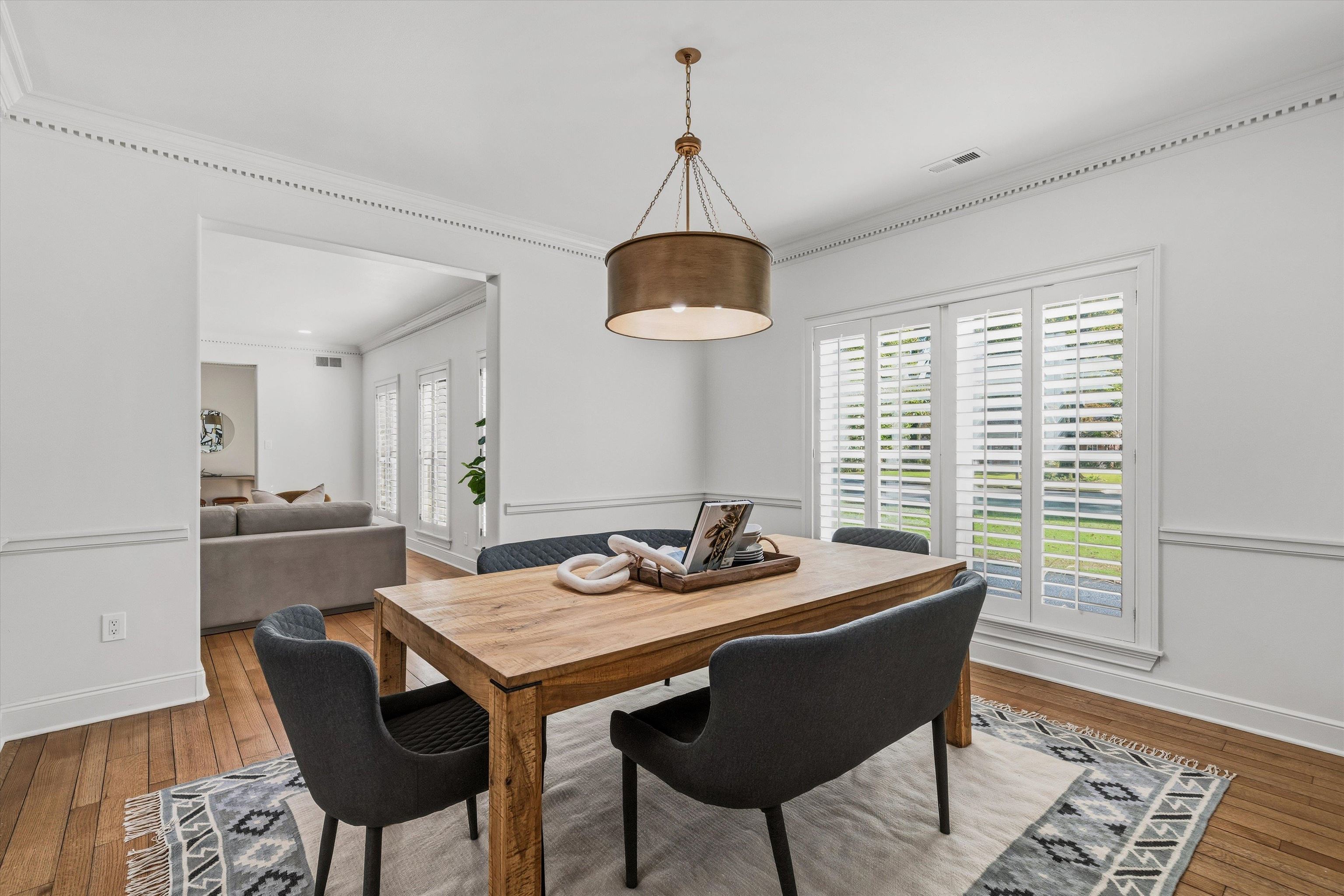 159 Perkins Extension Memphis, TN 38117 - Photo 12 of 37 a dining room with furniture and window
