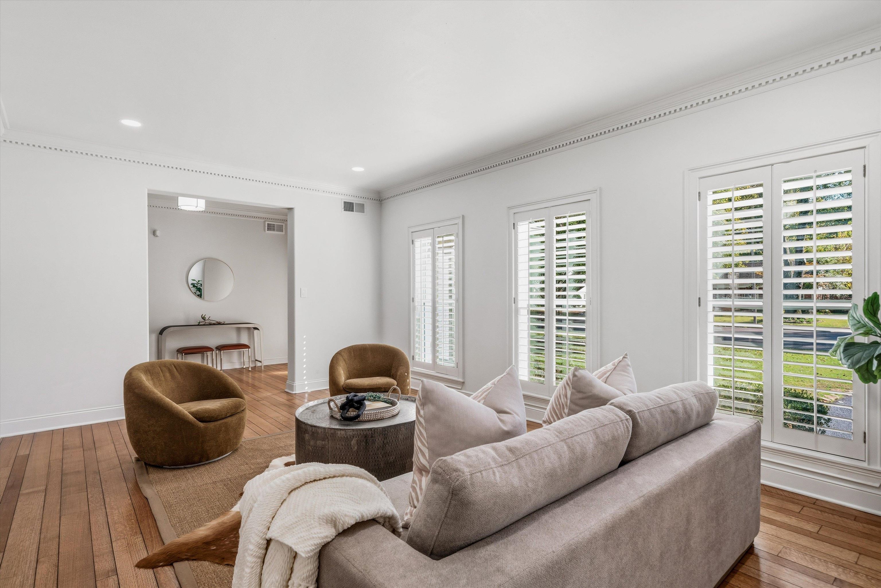 159 Perkins Extension Memphis, TN 38117 - Photo 13 of 37 a living room with furniture and a large window