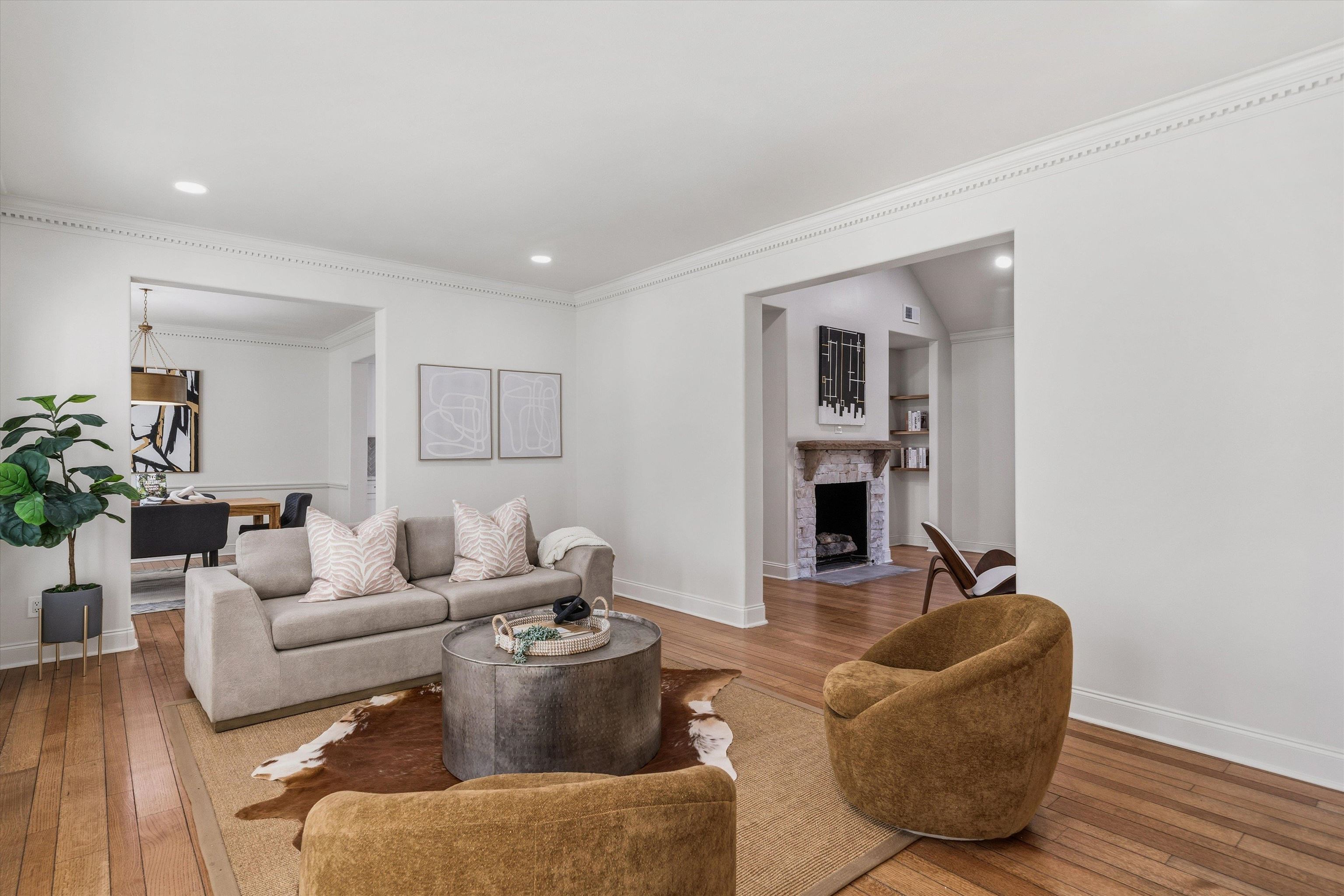 159 Perkins Extension Memphis, TN 38117 - Photo 14 of 37 a living room with furniture and a fireplace