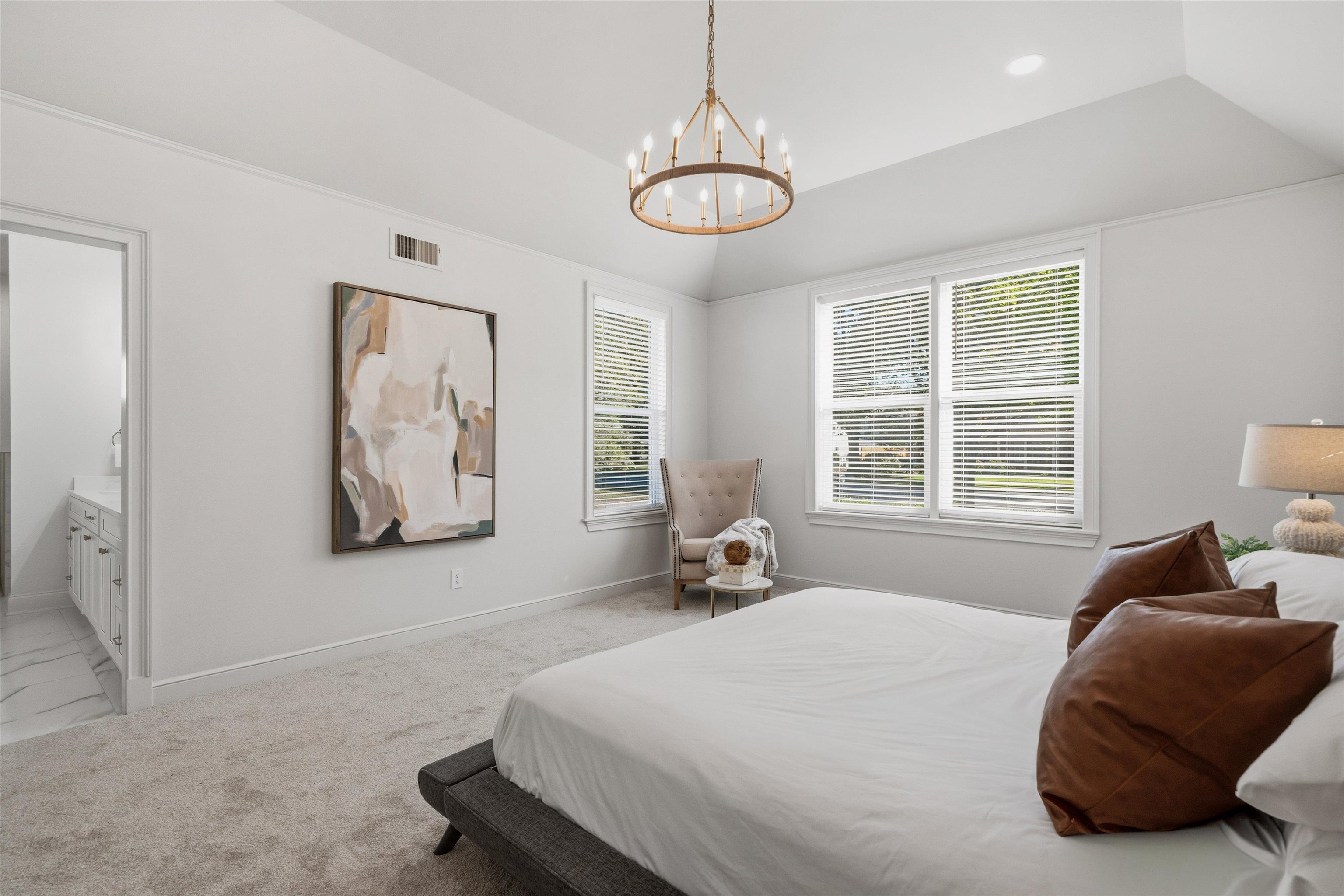 159 Perkins Extension Memphis, TN 38117 - Photo 19 of 37 a spacious bedroom with a bed and a window