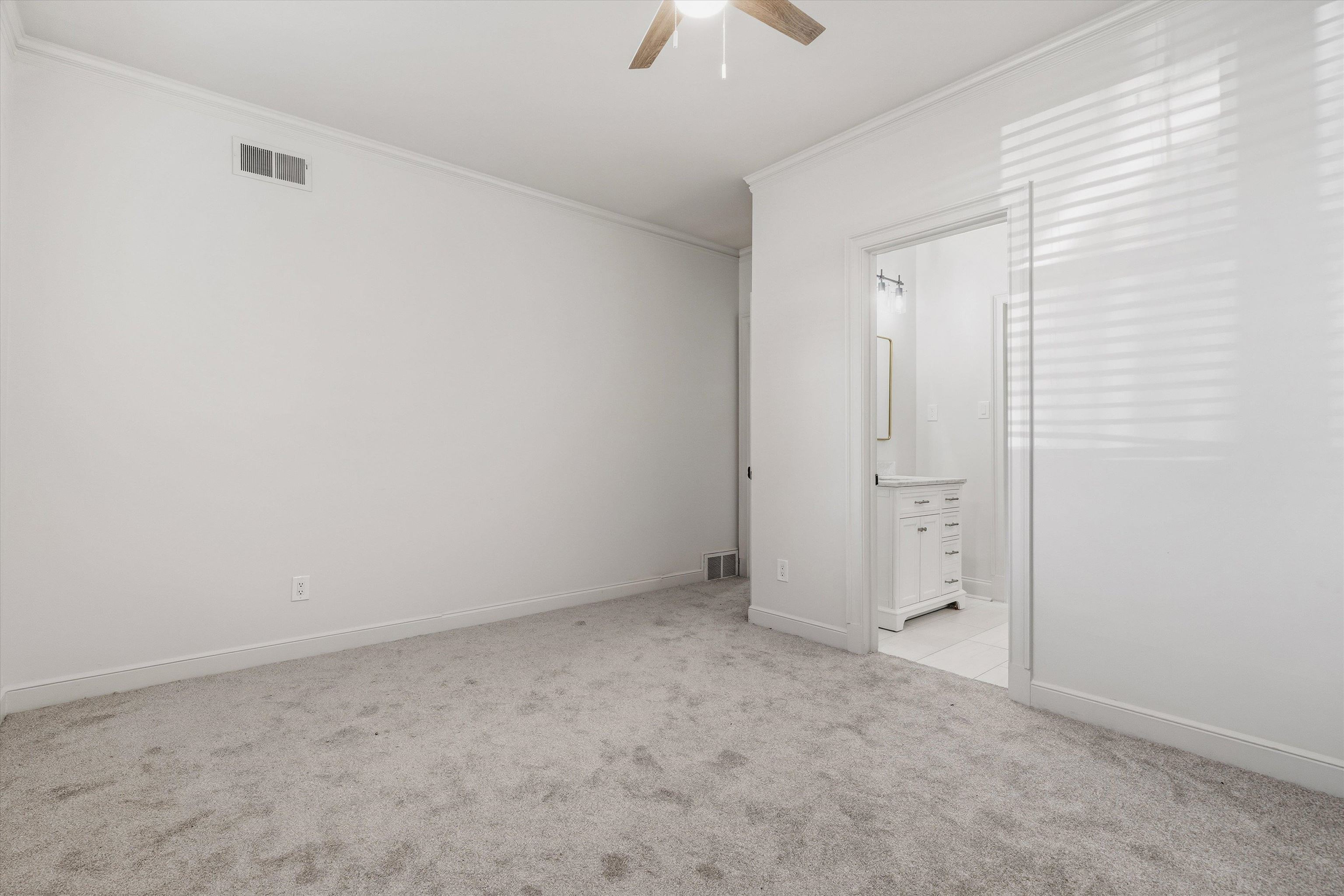 159 Perkins Extension Memphis, TN 38117 - Photo 24 of 37 an empty room with chandelier fan