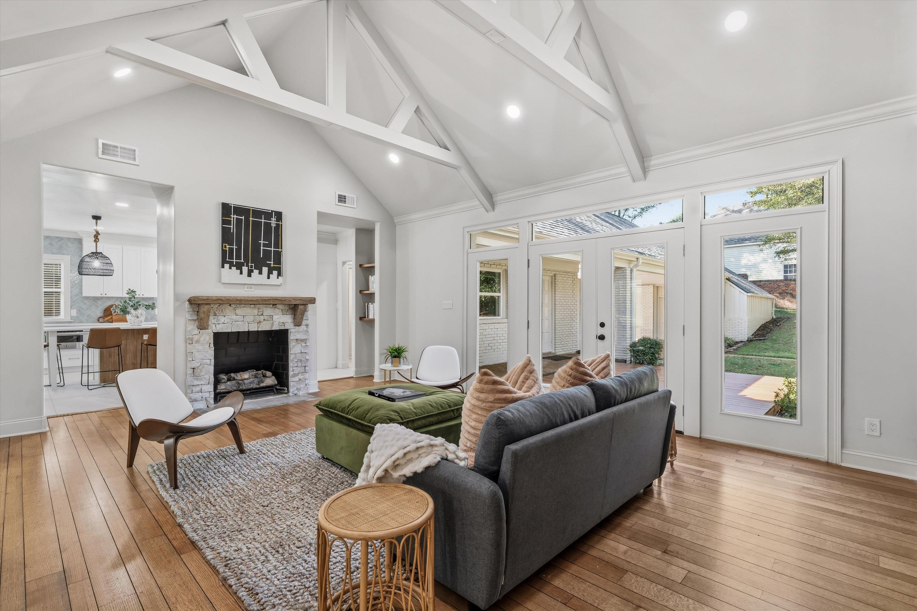 159 Perkins Extension Memphis, TN 38117 - Photo 3 of 37 a living room with furniture and a fireplace