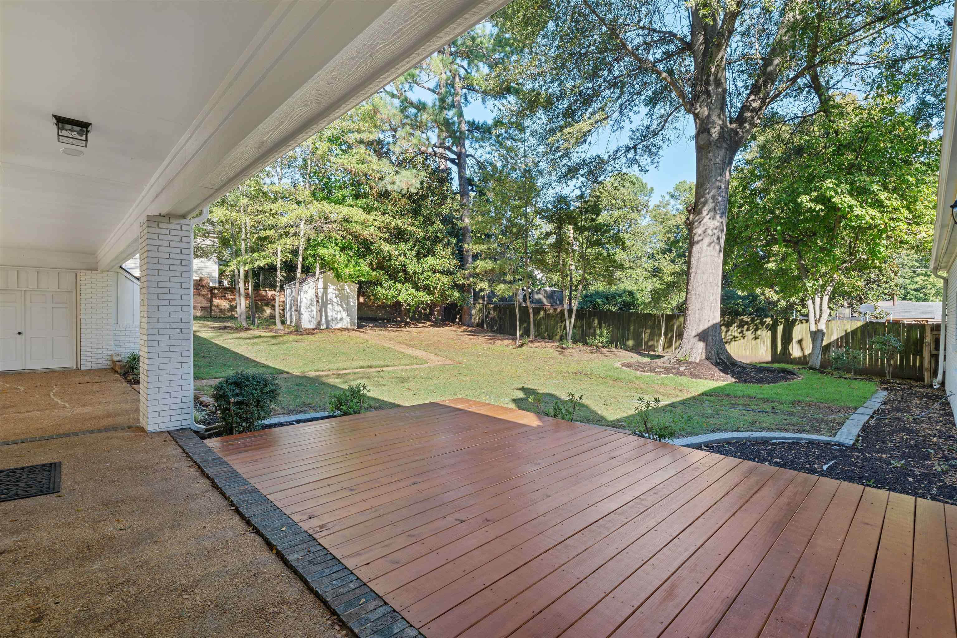 159 Perkins Extension Memphis, TN 38117 - Photo 36 of 37 a view of a house with a yard