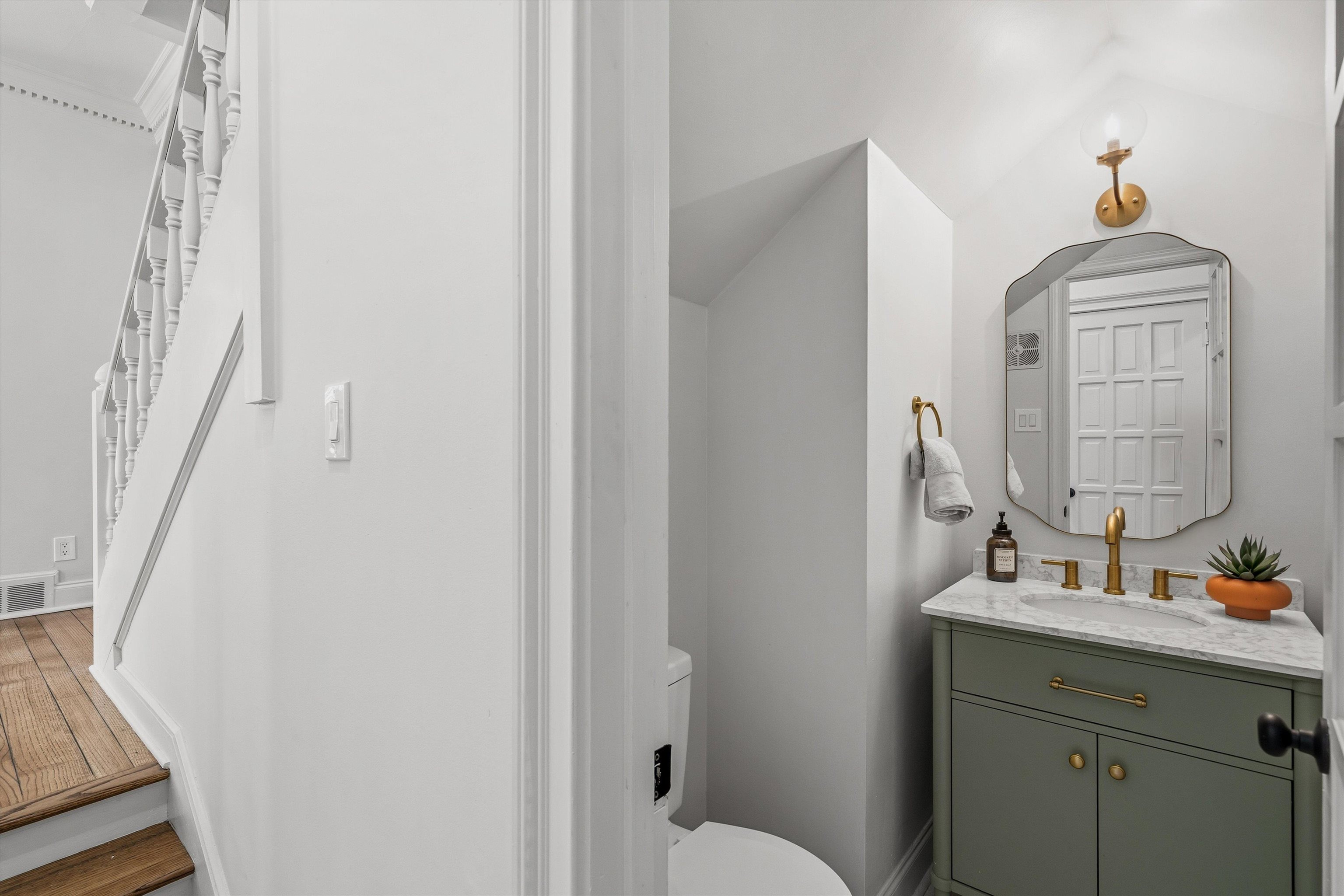 159 Perkins Extension Memphis, TN 38117 - Photo 6 of 37 a bathroom with a sink and a mirror