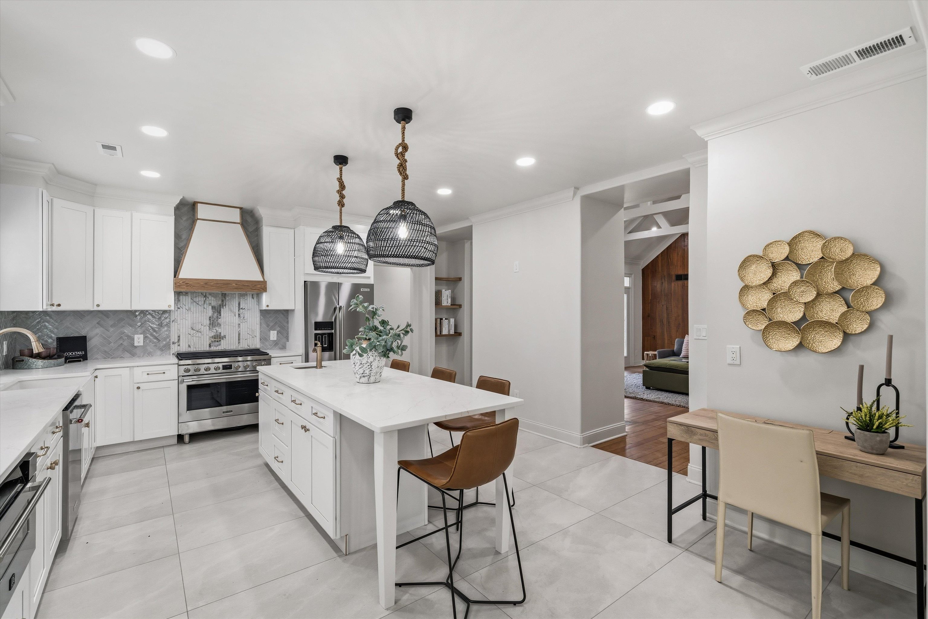 159 Perkins Extension Memphis, TN 38117 - Photo 10 of 37 a large kitchen with a stove a table and chairs