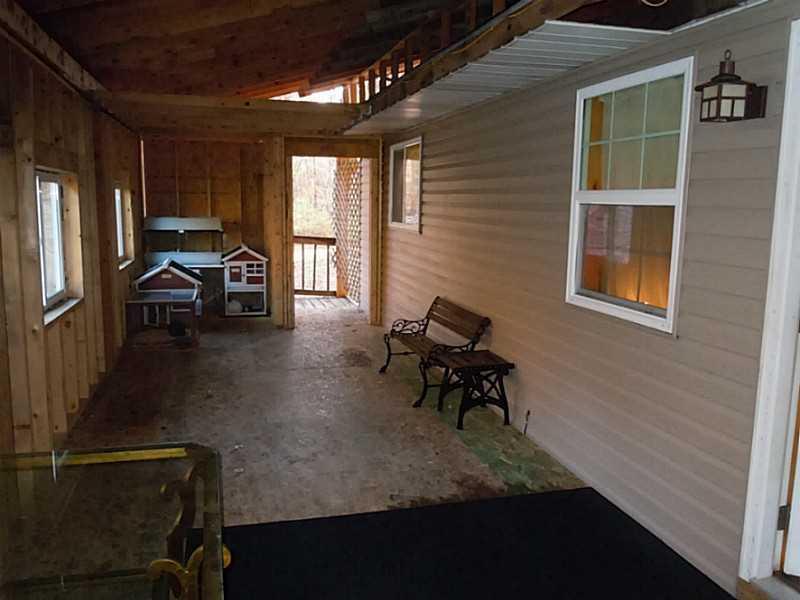 220 Odonnell Road Chicora, PA 16025 - Photo 17 of 21 Patio/Deck. Front Enclosed Porch