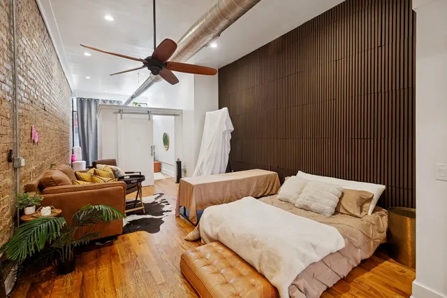 a bed room with a bed and a couch