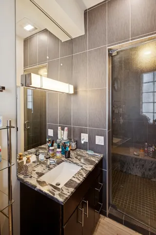 a bathroom with a sink and a mirror