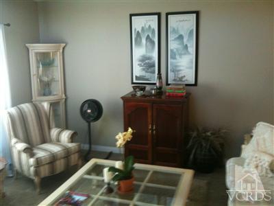 71994 Eleanora Lane Rancho Mirage, CA 92270 - Photo 2 of 9 a living room with furniture and a window