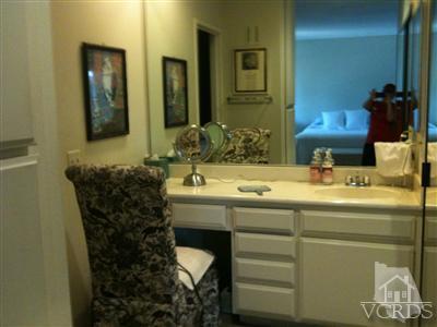 71994 Eleanora Lane Rancho Mirage, CA 92270 - Photo 9 of 9 a bathroom with a sink and a mirror