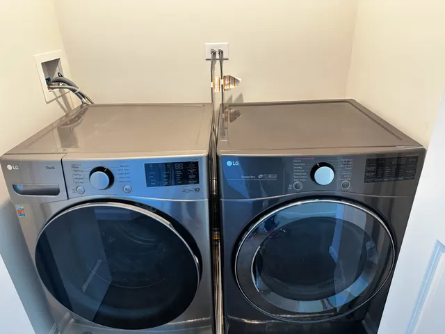 a utility room with dryer and washer