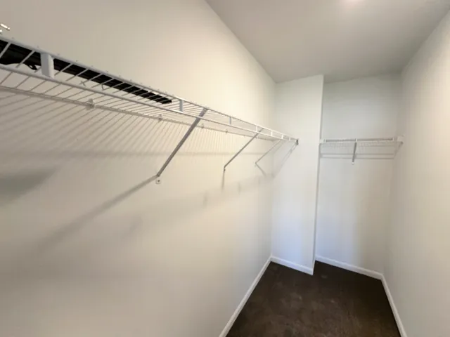 a view of a room with racks on the wall