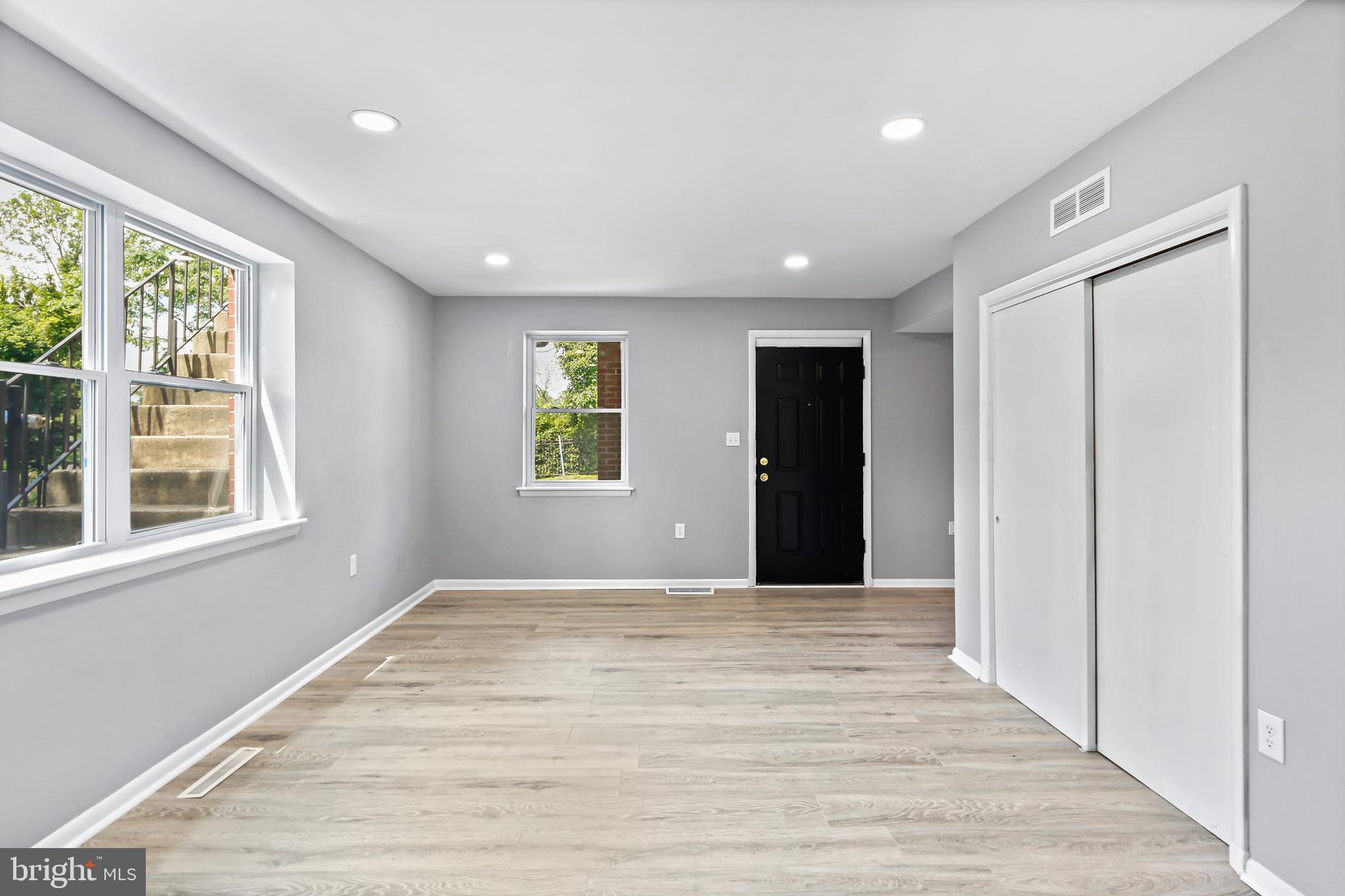 5636 Purdue Avenue Baltimore, MD 21239 - Photo 19 of 39 a view of an empty room with a window