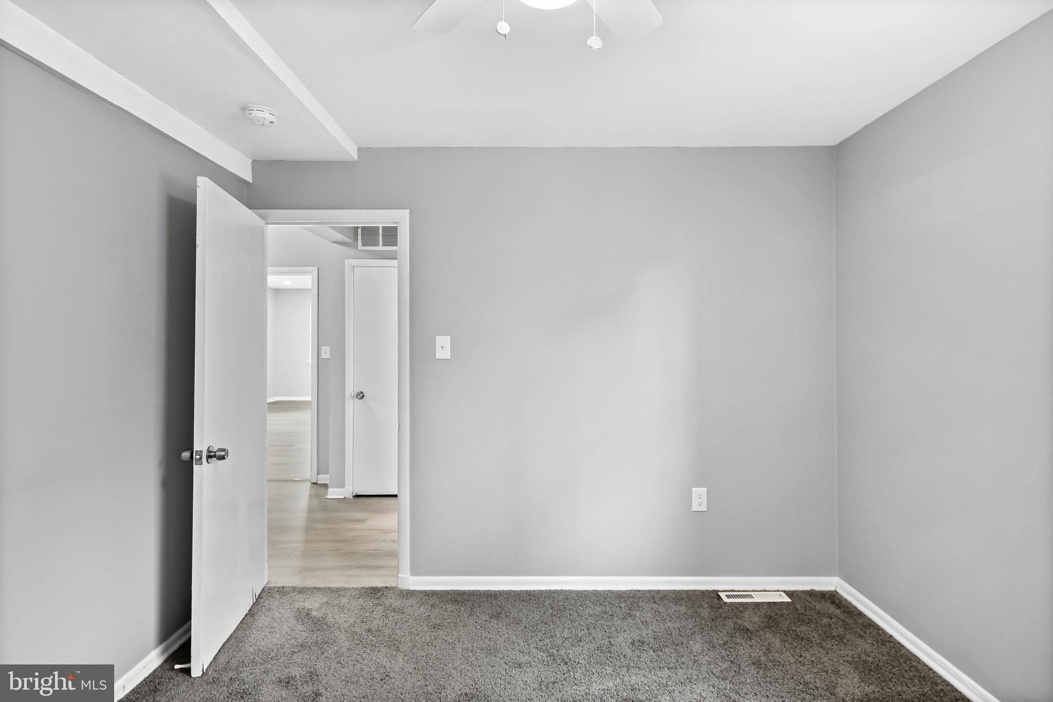 5636 Purdue Avenue Baltimore, MD 21239 - Photo 28 of 39 a view of a room with a hallway