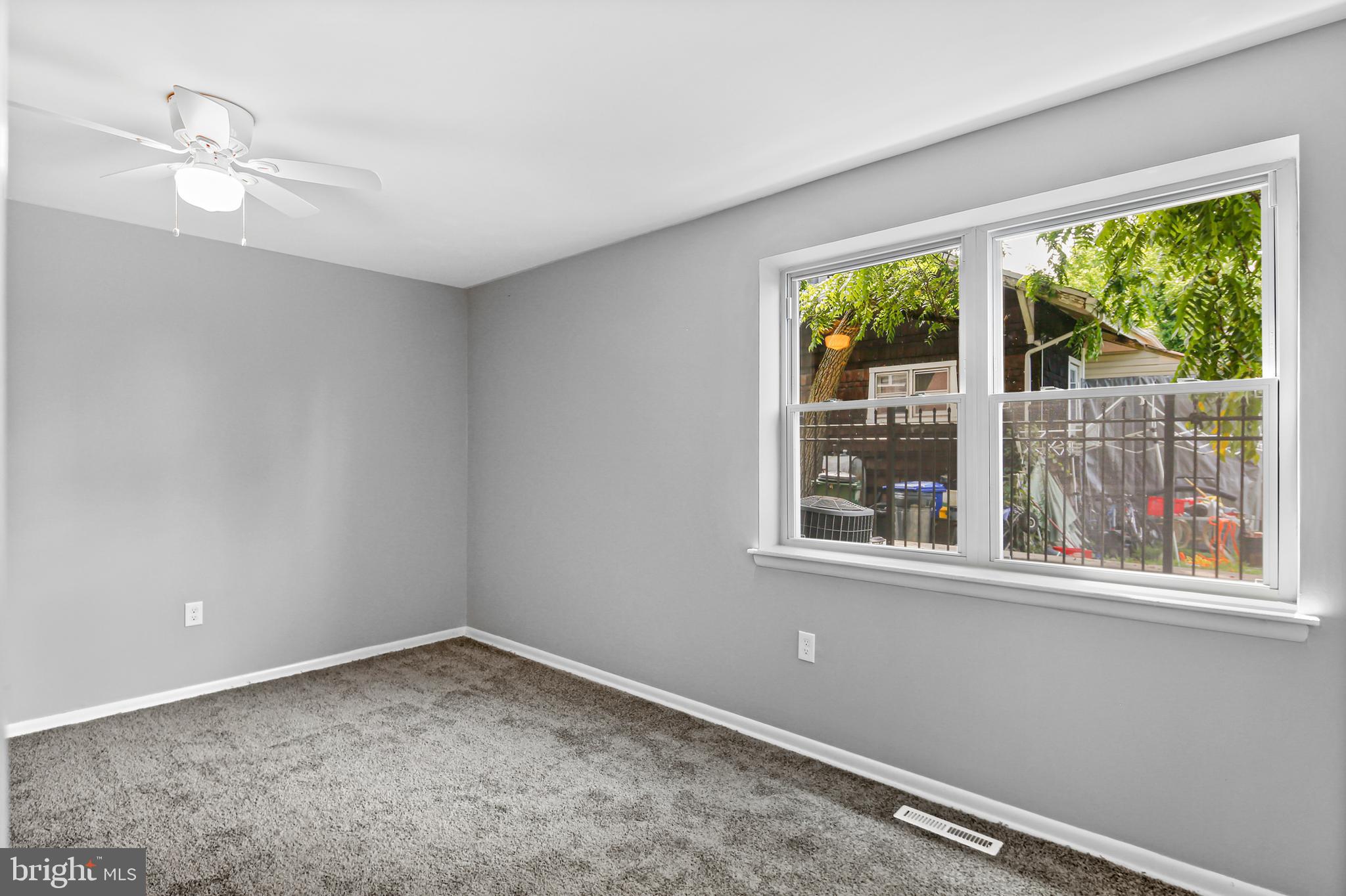 5636 Purdue Avenue Baltimore, MD 21239 - Photo 30 of 39 an empty room with a window