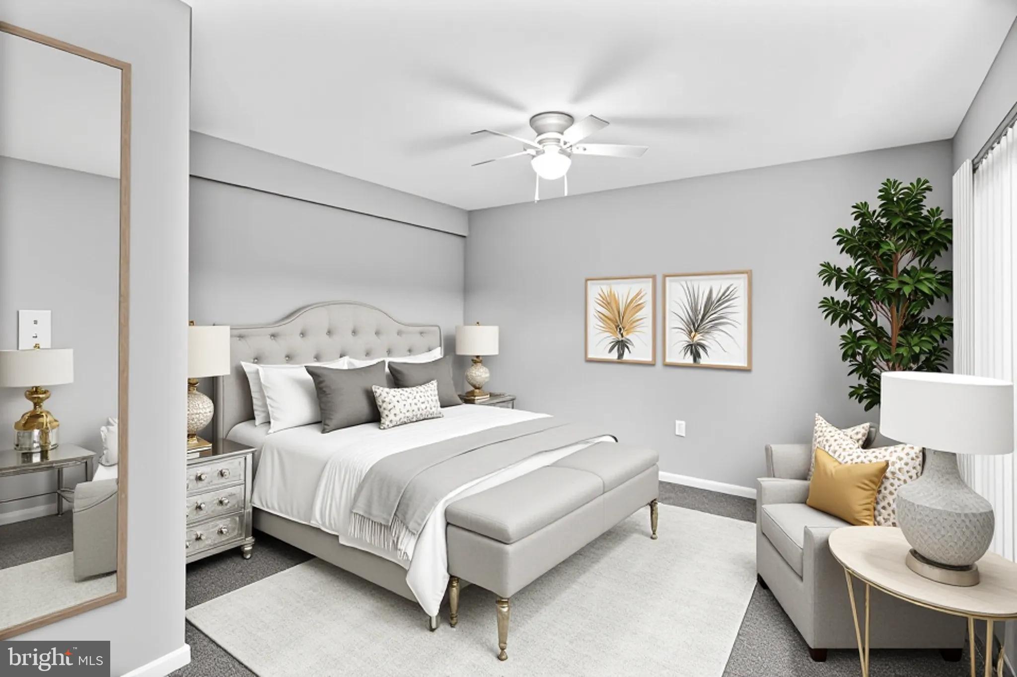 5636 Purdue Avenue Baltimore, MD 21239 - Photo 33 of 39 a bedroom with a bed and a chandelier