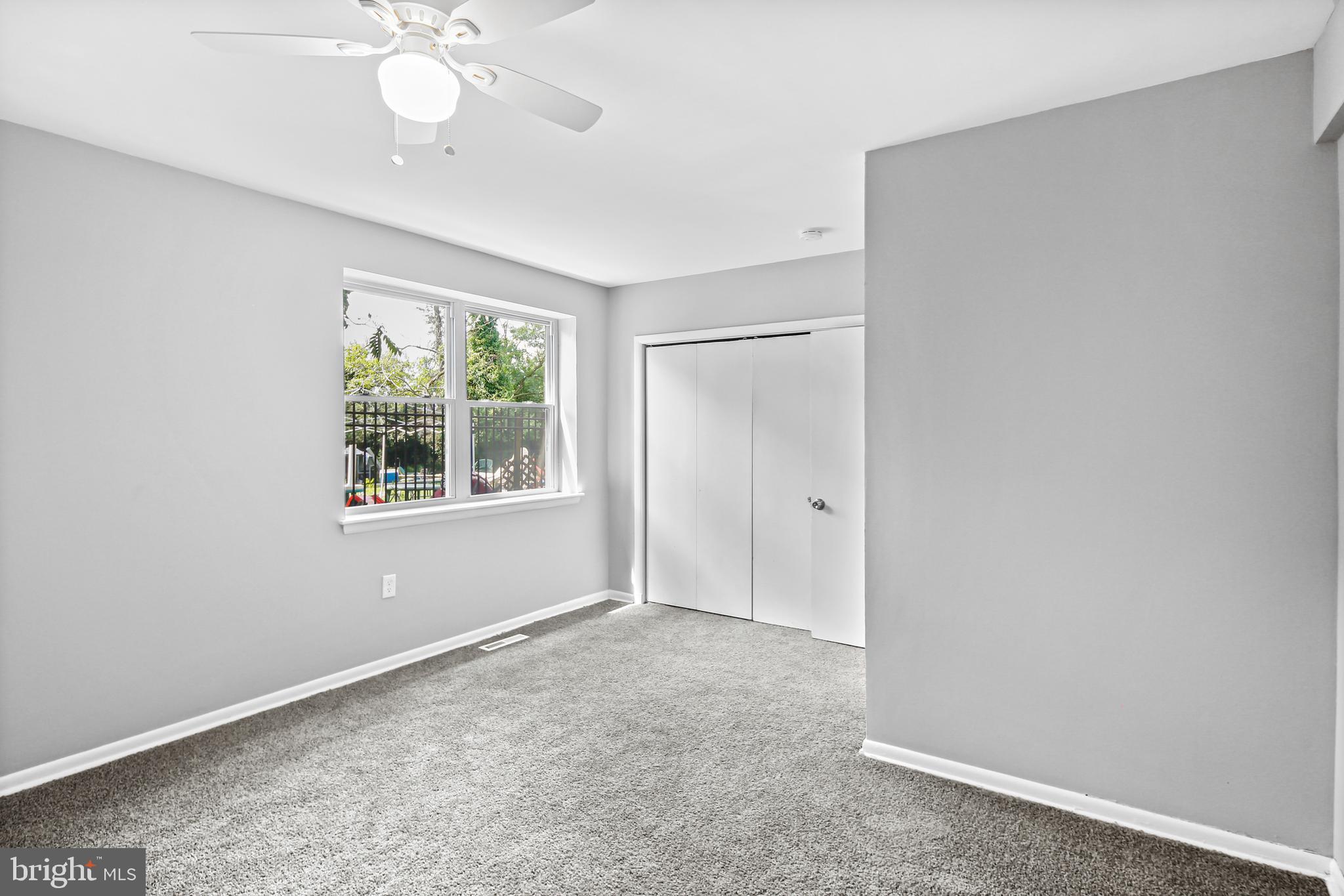 5636 Purdue Avenue Baltimore, MD 21239 - Photo 35 of 39 an empty room with a window