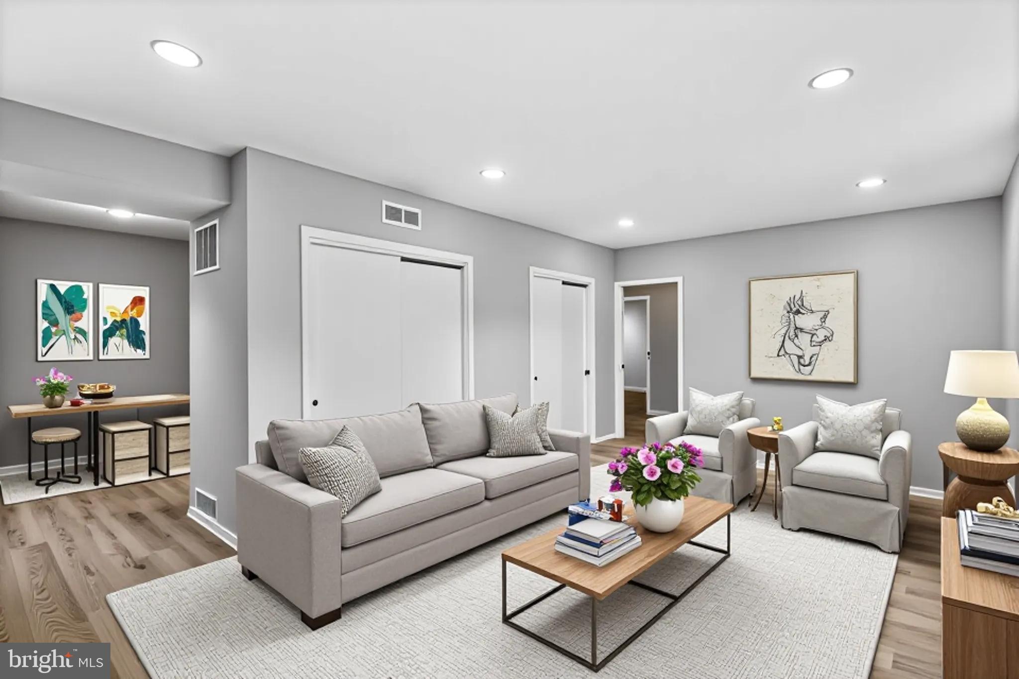 5636 Purdue Avenue Baltimore, MD 21239 - Photo 6 of 39 a living room with furniture and wooden floor