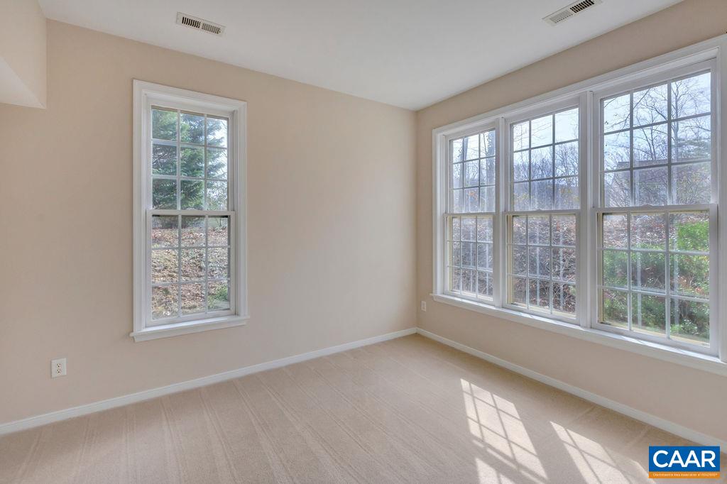 320 Starcrest Road Charlottesville, VA 22902 - Photo 5 of 38 a view of an empty room with a window