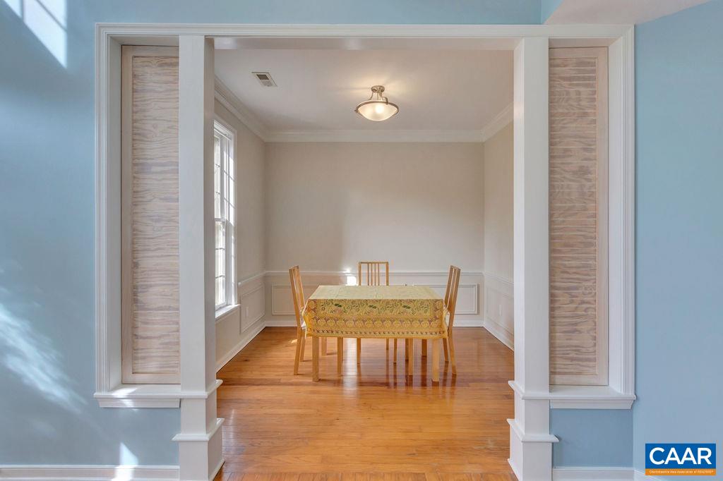 320 Starcrest Road Charlottesville, VA 22902 - Photo 7 of 38 a view of a dining room with furniture and window