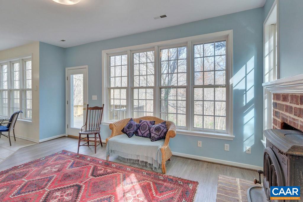 320 Starcrest Road Charlottesville, VA 22902 - Photo 8 of 38 a living room with furniture and a window