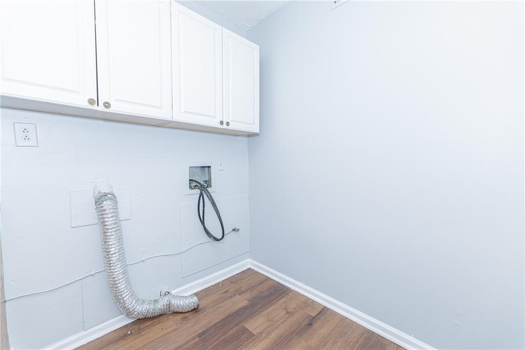 2398 Lawrenceville Highway, Unit U Decatur, GA 30033 - Photo 11 of 32 a bathroom with a glass shower door