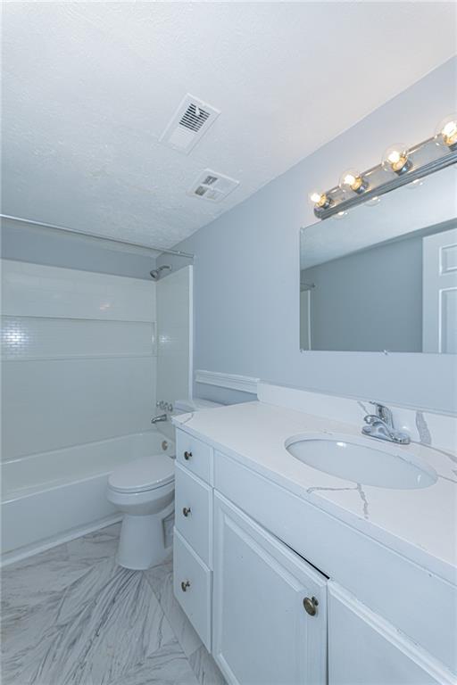 2398 Lawrenceville Highway, Unit U Decatur, GA 30033 - Photo 16 of 32 a bathroom with a sink a toilet and shower