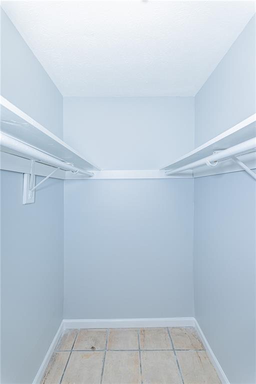 2398 Lawrenceville Highway, Unit U Decatur, GA 30033 - Photo 21 of 32 a view of an empty walk in closet