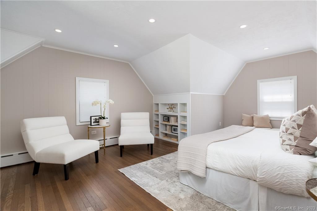 1748 Stratfield Road Fairfield, CT 06825 - Photo 17 of 30 a bedroom with a bed and furniture