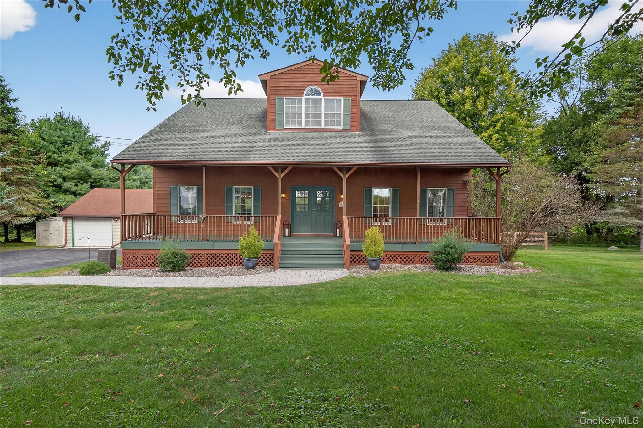 63 Brimstone Hill Road Middletown, NY 10941 - Photo 1 of 1 a view of a house with a yard and sitting area