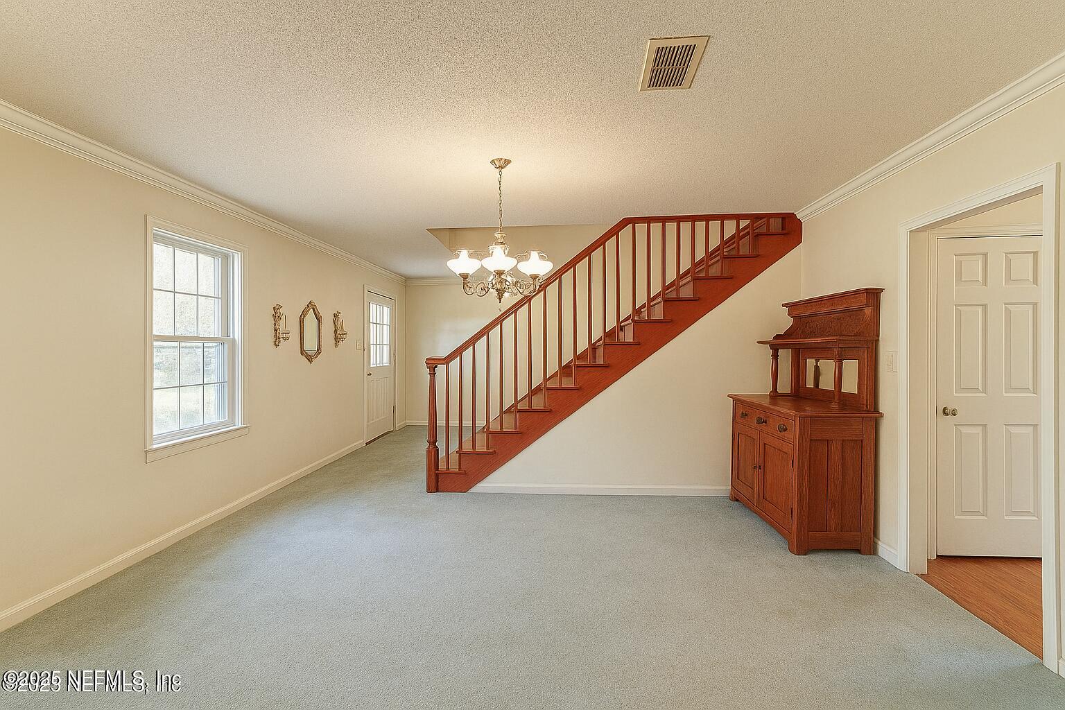 1610 Rivers Road Green Cove Springs, FL 32043 - Photo 16 of 64 a view of entryway and hall with a window