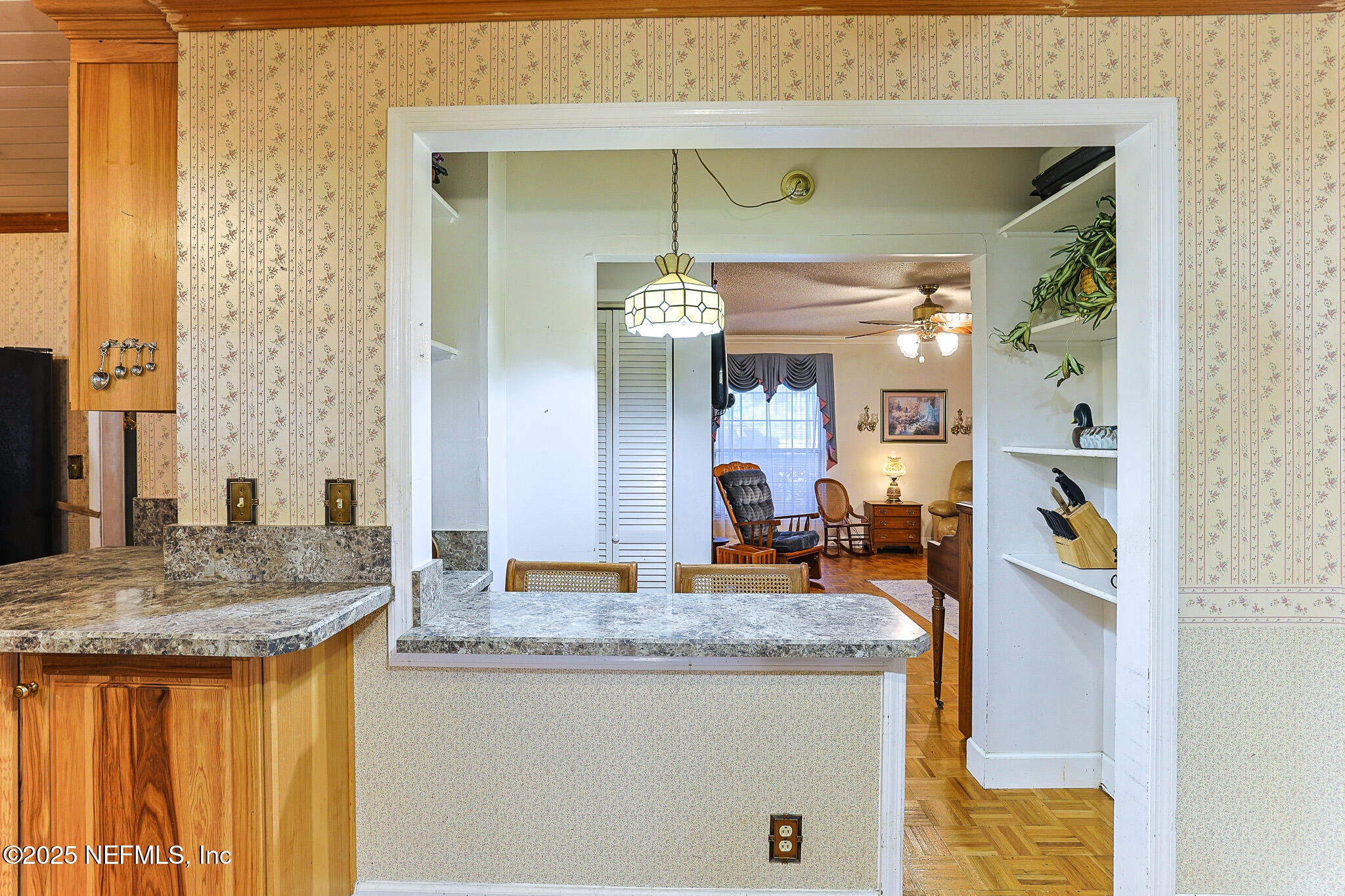 1610 Rivers Road Green Cove Springs, FL 32043 - Photo 31 of 64 a bathroom with sink granite counter top and a view of living room