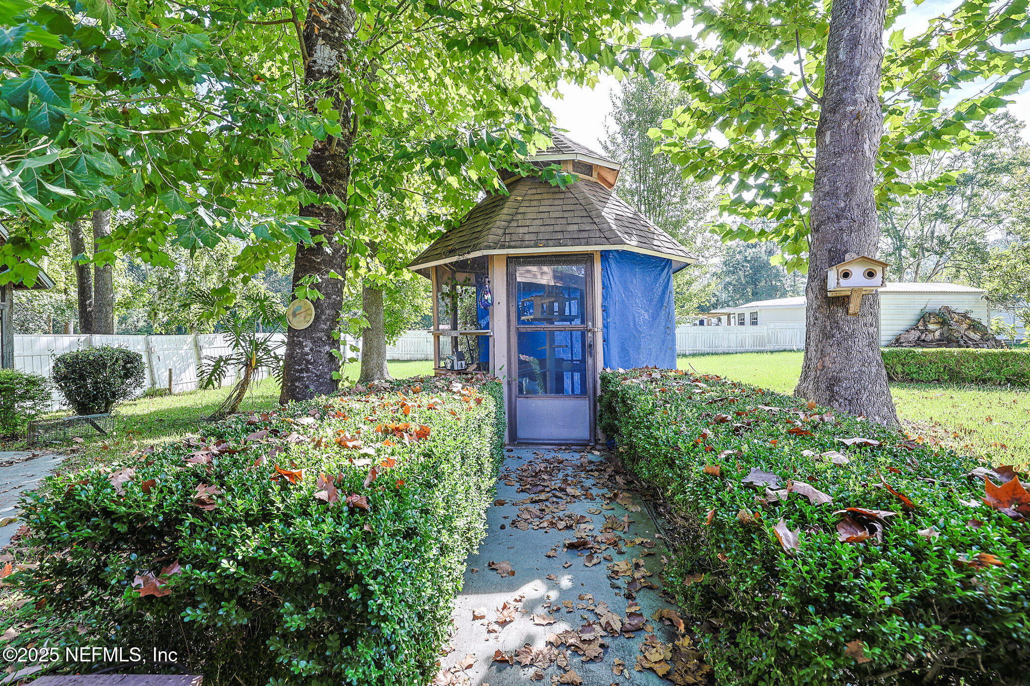 1610 Rivers Road Green Cove Springs, FL 32043 - Photo 44 of 64 a front view of a house with garden