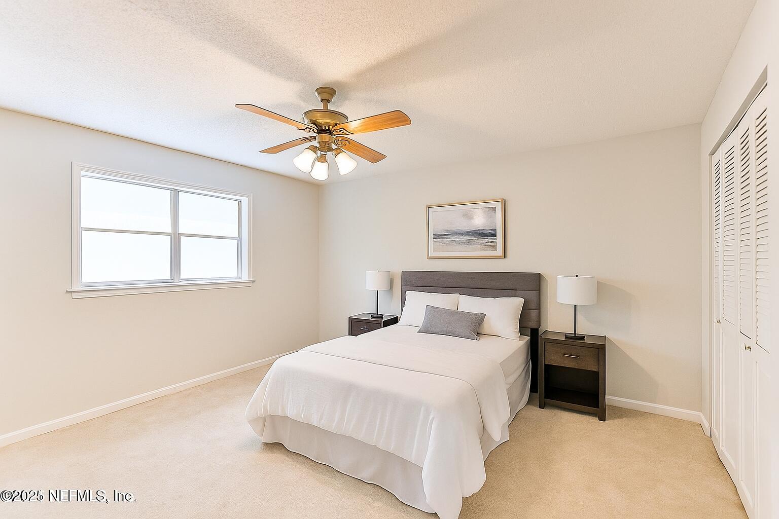 1610 Rivers Road Green Cove Springs, FL 32043 - Photo 56 of 64 a bedroom with a bed and a window