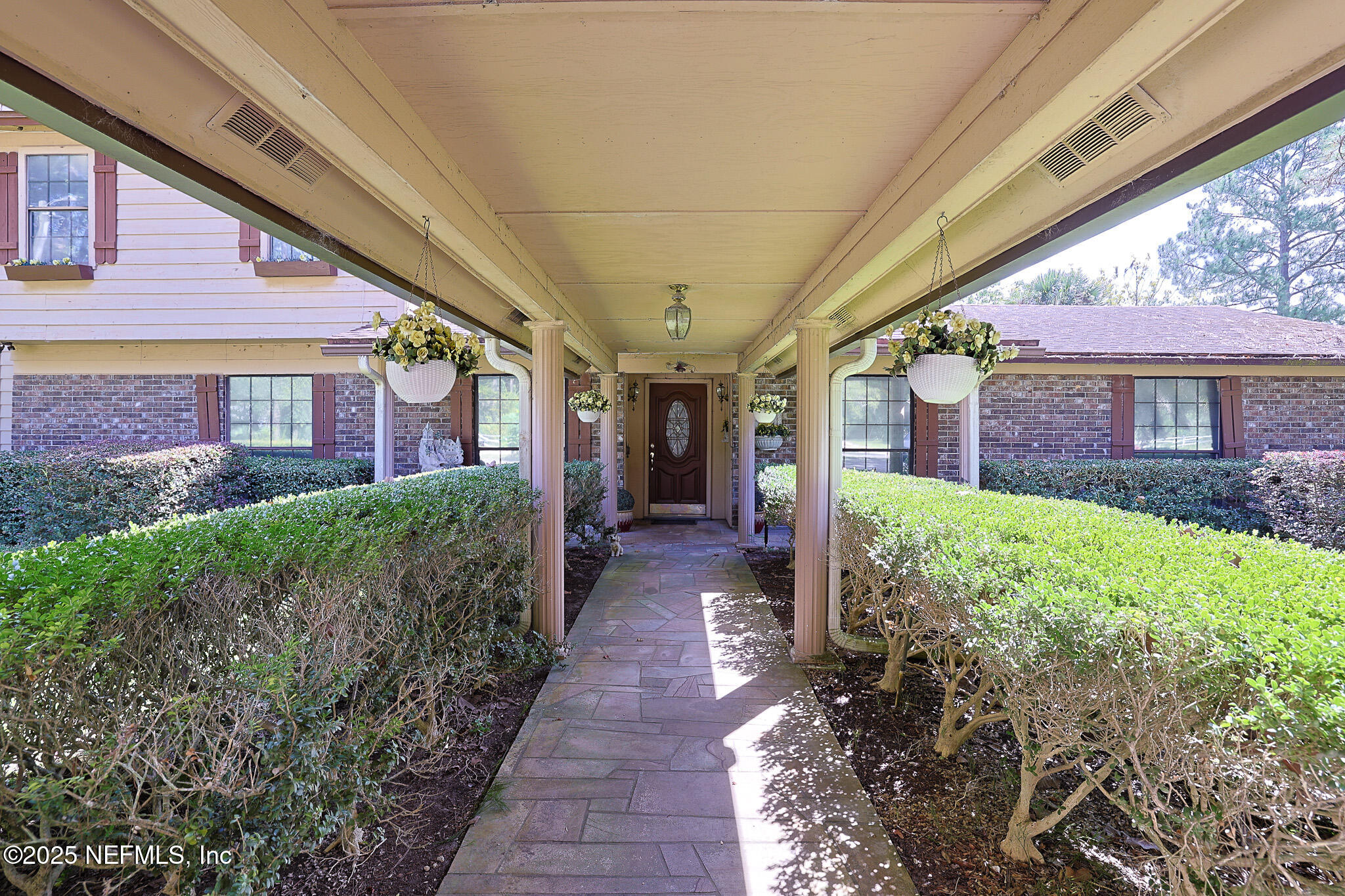 1610 Rivers Road Green Cove Springs, FL 32043 - Photo 10 of 64 a view of a pathway with a house