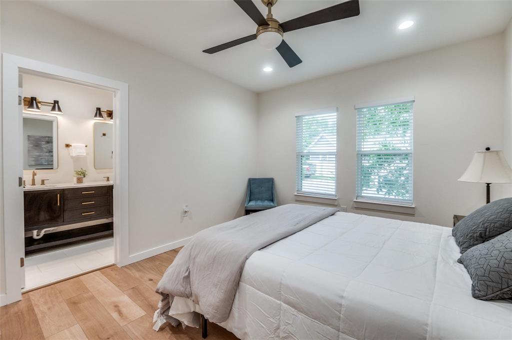 602 Brooks Avenue Dallas, TX 75208 - Photo 15 of 22 a bedroom with a bed and a view of bedroom