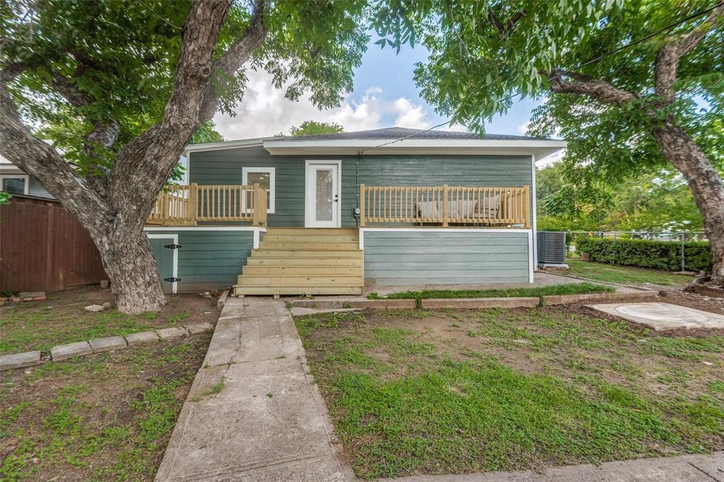 602 Brooks Avenue Dallas, TX 75208 - Photo 20 of 22 a view of a house with a yard