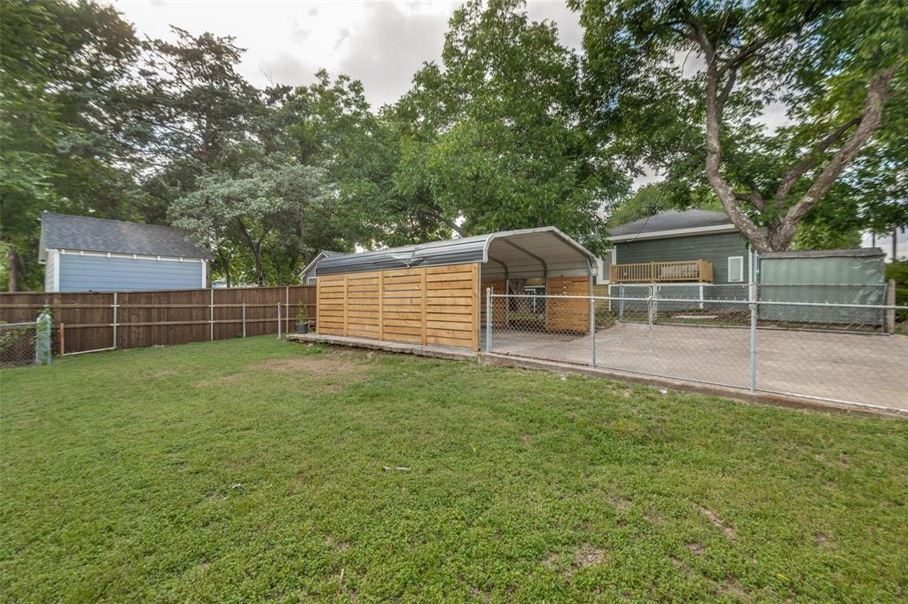 602 Brooks Avenue Dallas, TX 75208 - Photo 22 of 22 a view of a backyard with a garden and entertaining space
