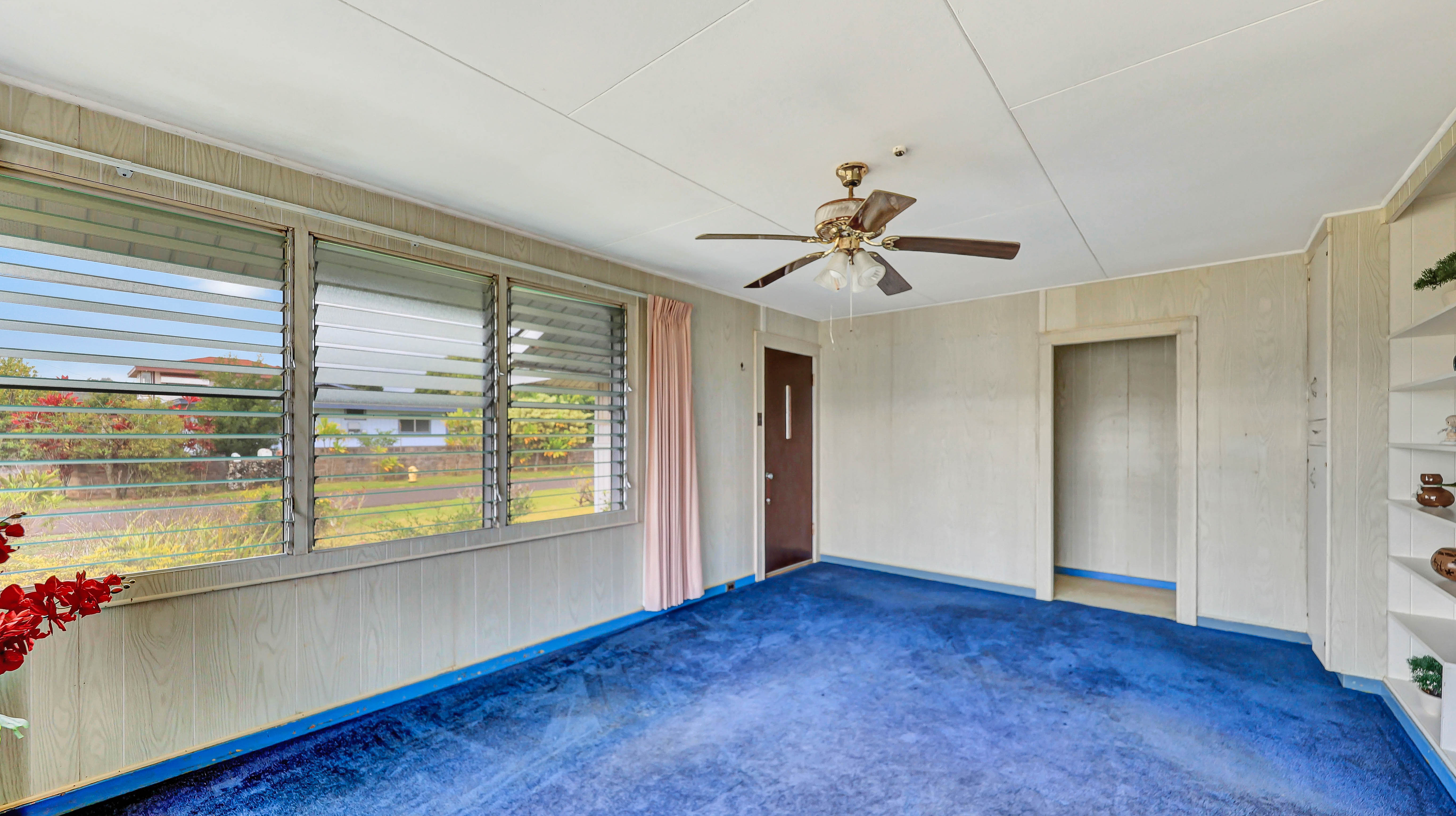 5116 Kula Road Kapaa, HI 96746 - Photo 11 of 28 a view of an empty room with a window and wooden floor