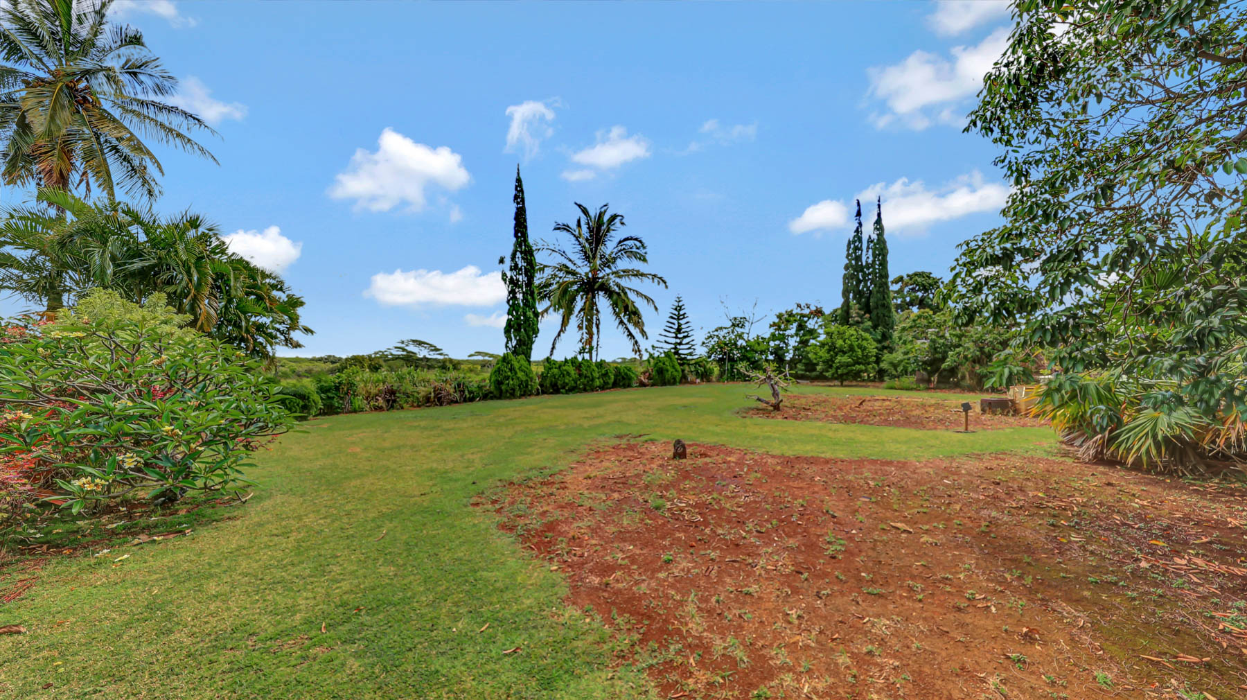 5116 Kula Road Kapaa, HI 96746 - Photo 19 of 28 a view of a golf course with a lake