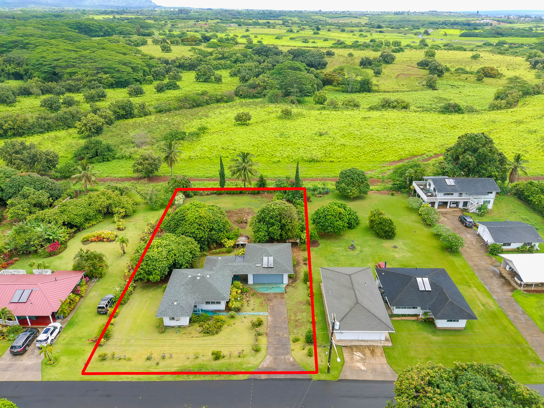 5116 Kula Road Kapaa, HI 96746 - Photo 2 of 28 an aerial view of residential houses with outdoor space and swimming pool