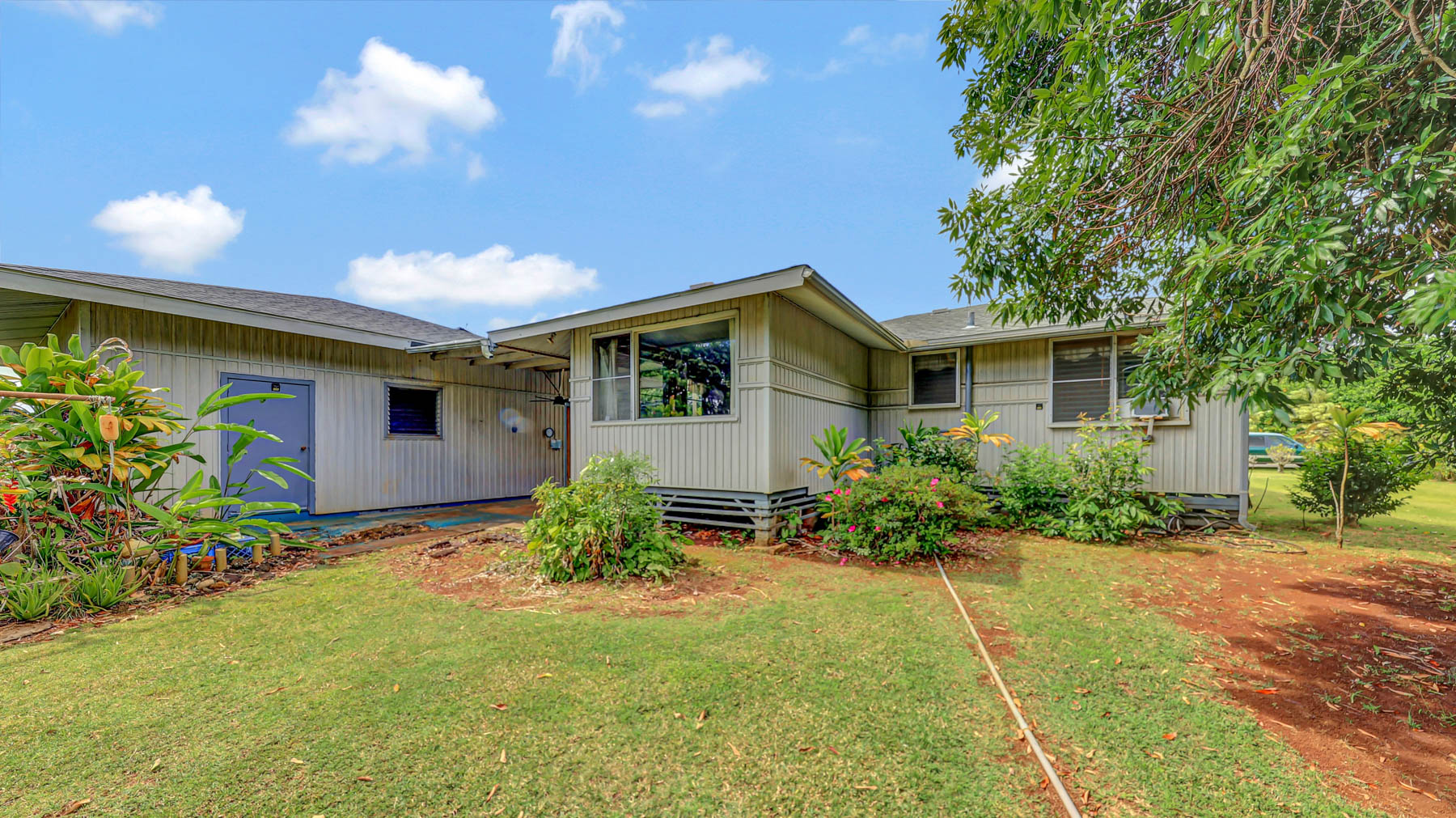 5116 Kula Road Kapaa, HI 96746 - Photo 23 of 28 a front view of house with yard and trees around
