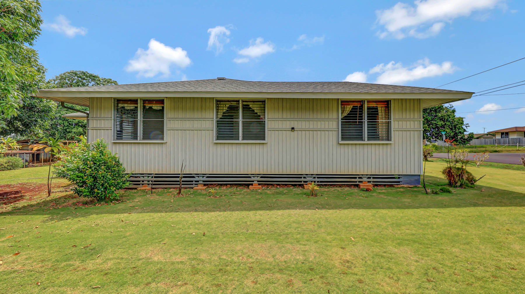 5116 Kula Road Kapaa, HI 96746 - Photo 24 of 28 a front view of a house with a yard