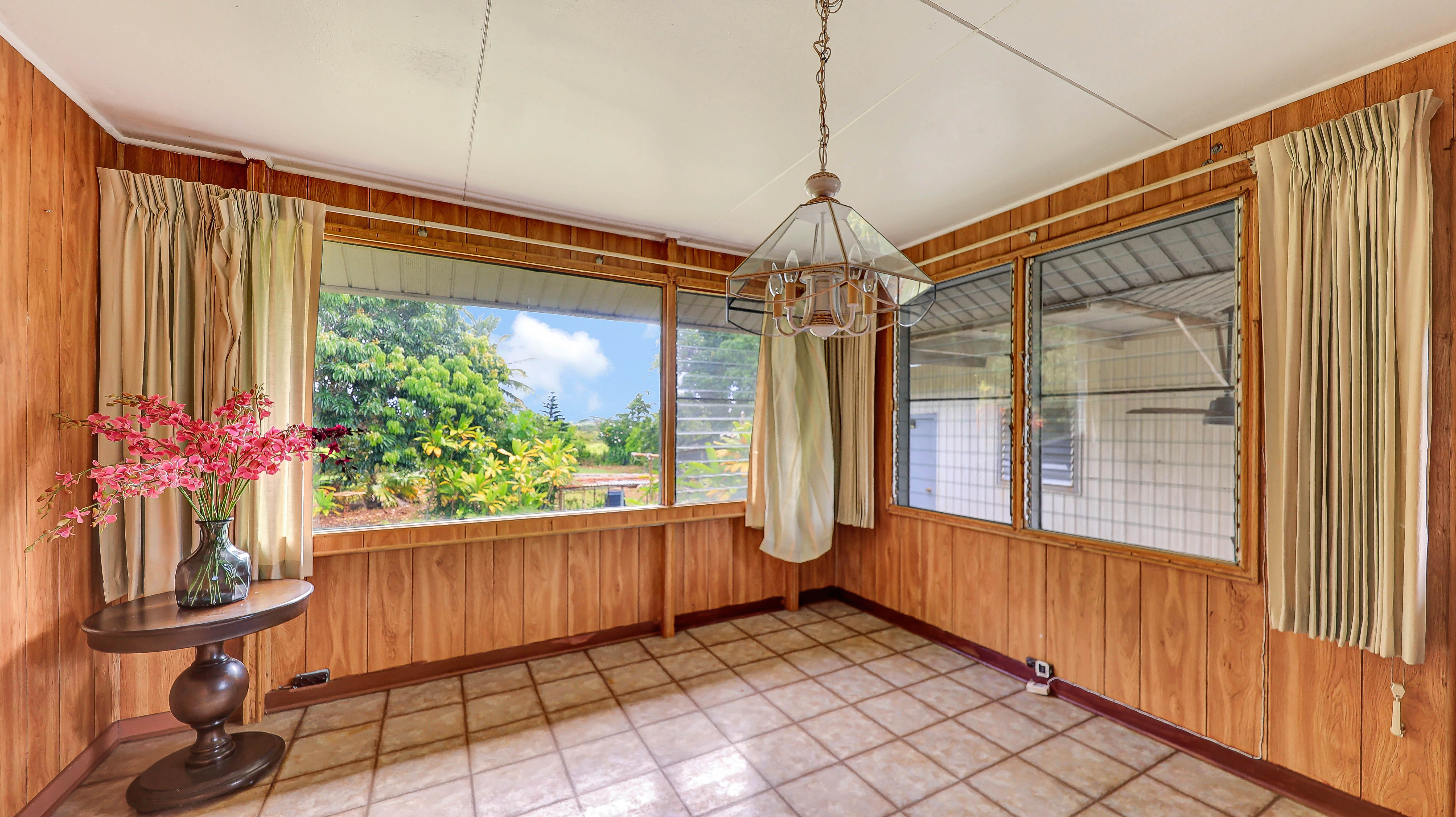 5116 Kula Road Kapaa, HI 96746 - Photo 3 of 28 a view of entryway with a front door and wooden floor